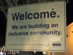 Sign that Reads: Welcome. We are building an inclusive community.